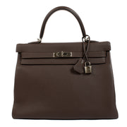 Luxurious Hermès Kelly 35 Chocolat Togo handbag, perfect for timeless elegance