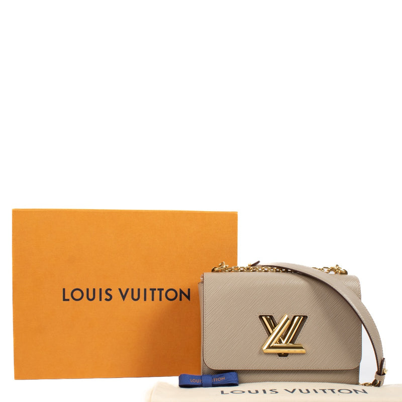 Shop safe online at Labellov in Antwerp, Brussels and Knokke this 100% authentic second hand Louis Vuitton Galet Epi Leather MM Twist. Veiling online tweedehands authentieke Louis Vuitton Galet Epi Leather MM Twist handtas kopen bij Labellov.