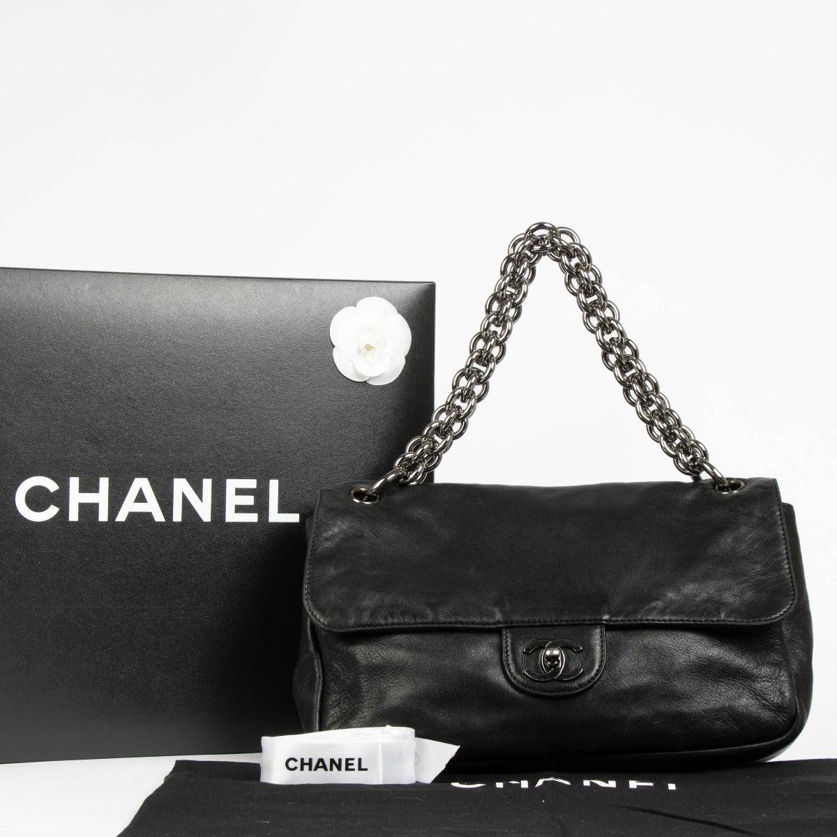 Authentic pre-loved Chanel Black Lambskin Chain Flap Shoulder Bag on Labellov.com
