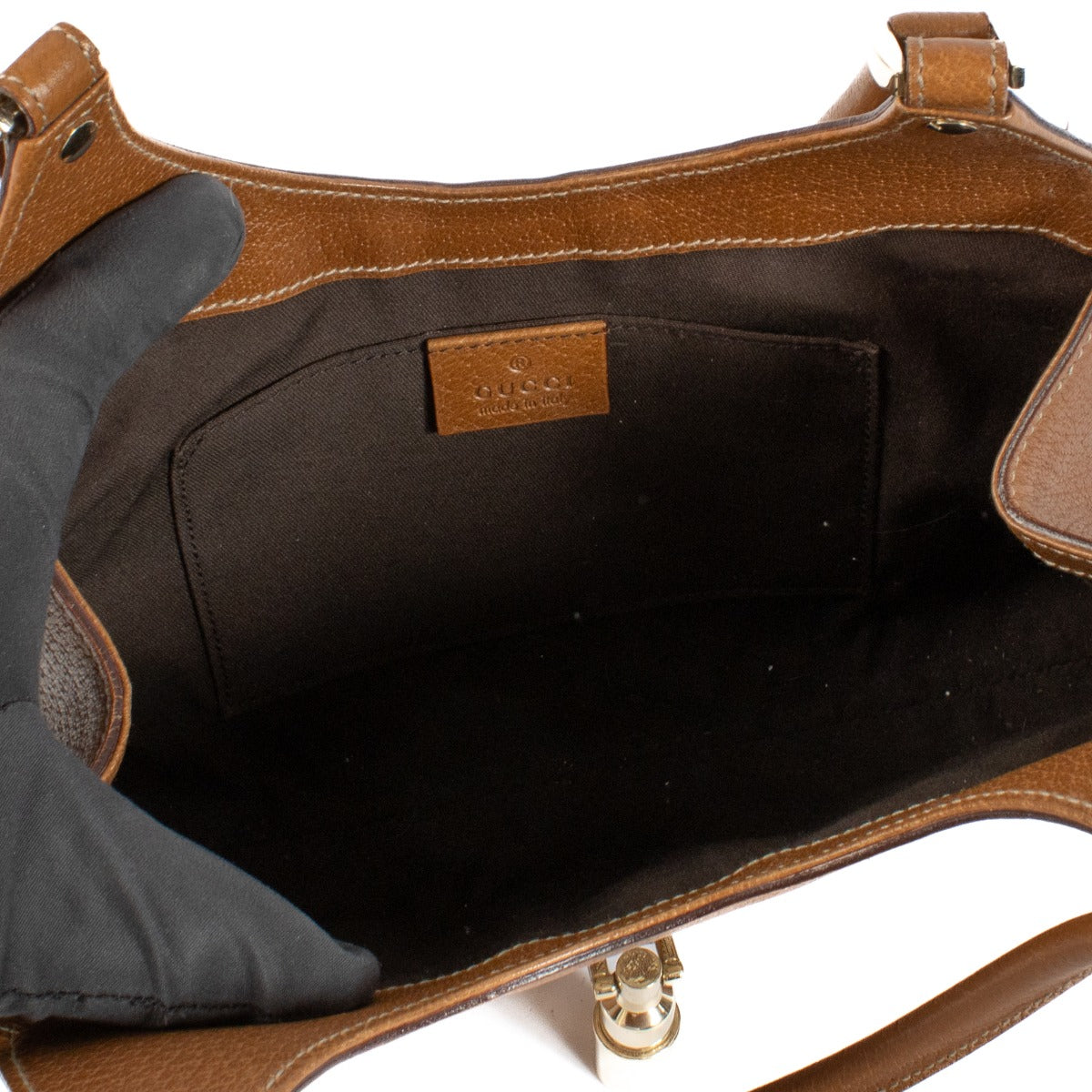 Shop 100% authentic Gucci Brown Leather Monogram Jackie Hobo Small Bag at Labellov.com.