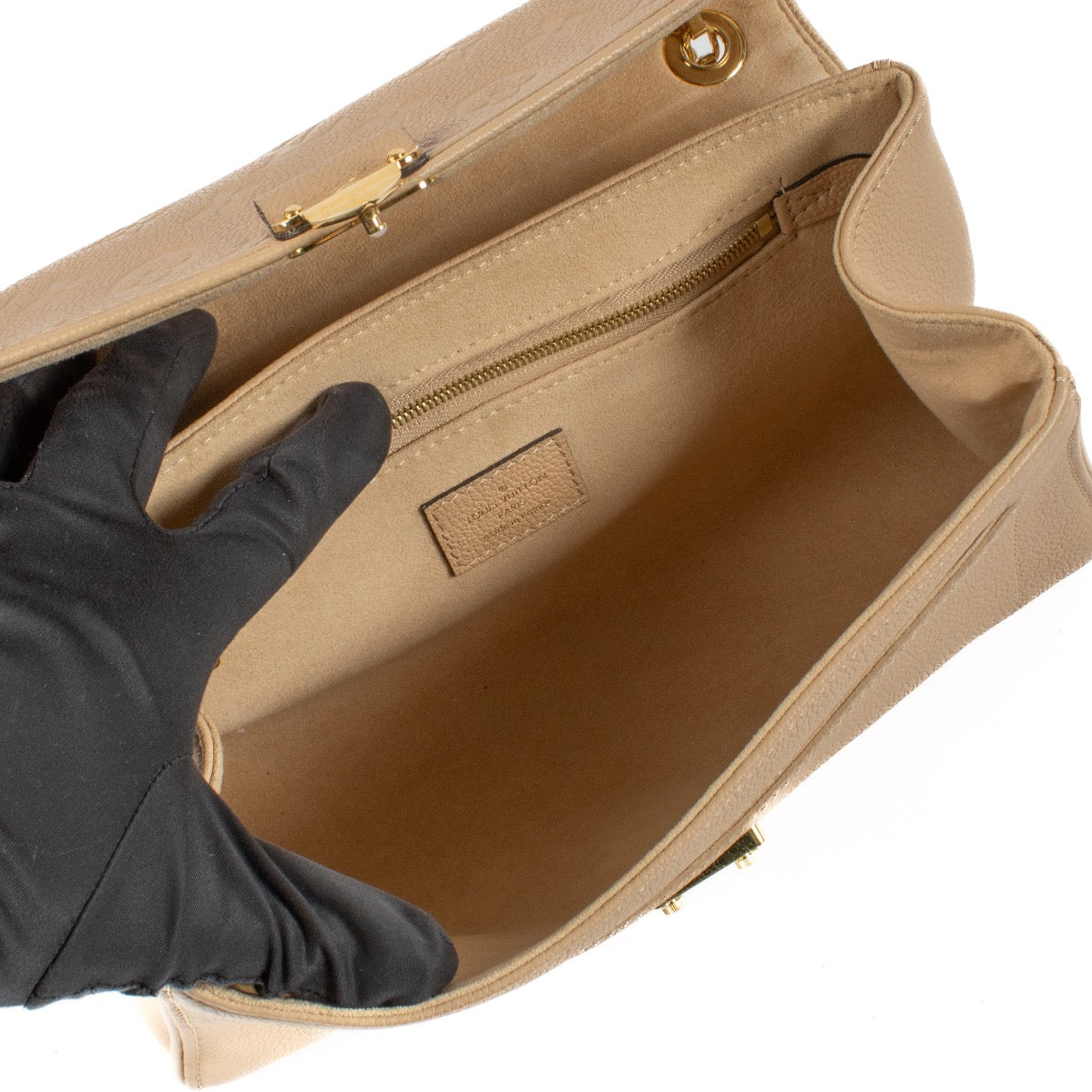 Shop safe online at Labellov in Antwerp, Brussels and Knokke this 100% authentic second hand Louis Vuitton Beige Monogram Empreinte Pallas Crossbody