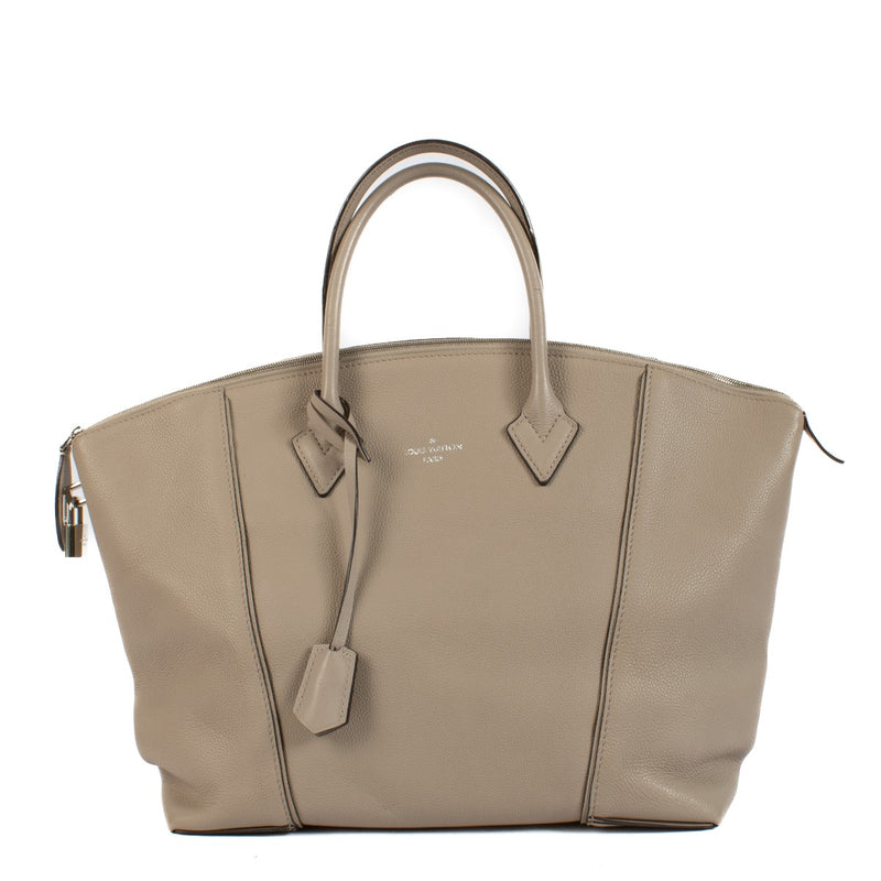 Shop 100% authentic Louis Vuitton Galet Veau Cashemire Soft Lockit MM Top Handle Bag at Labellov.com.