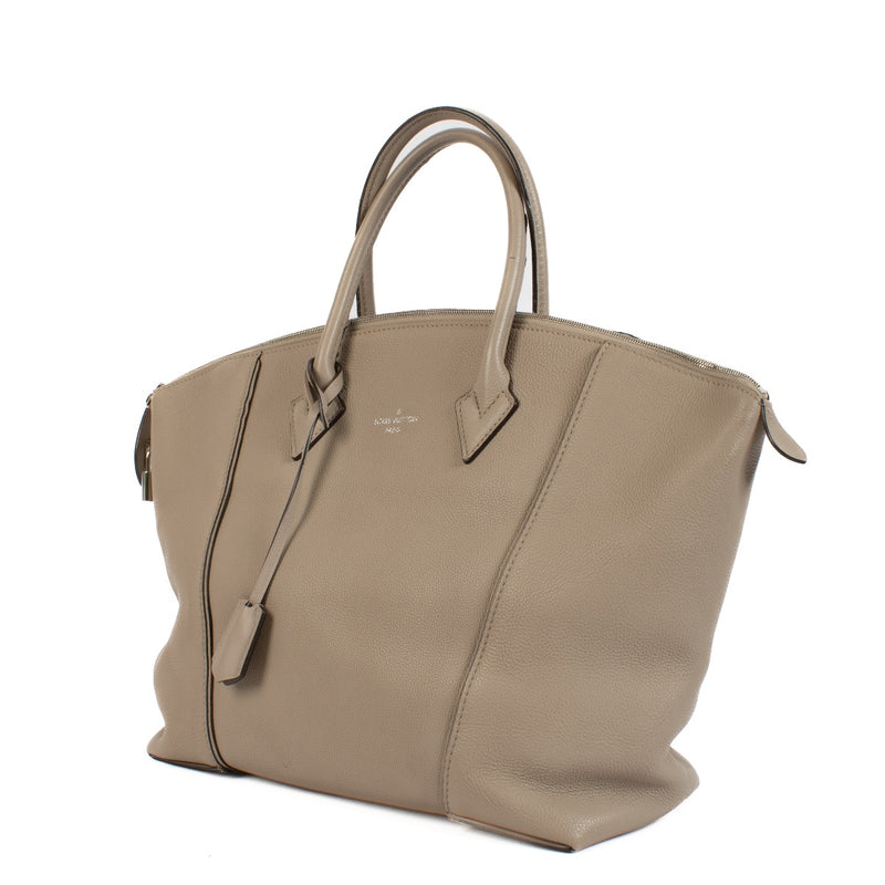 Shop 100% authentic Louis Vuitton Galet Veau Cashemire Soft Lockit MM Top Handle Bag at Labellov.com.