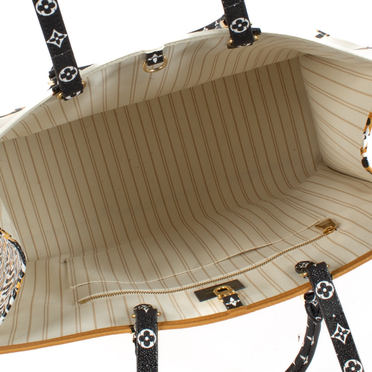 Shop safe online at Labellov in Antwerp, Brussels and Knokke this 100% authentic second hand Louis Vuitton Limited Edition Jungle OnTheGo GM Tote Bag
