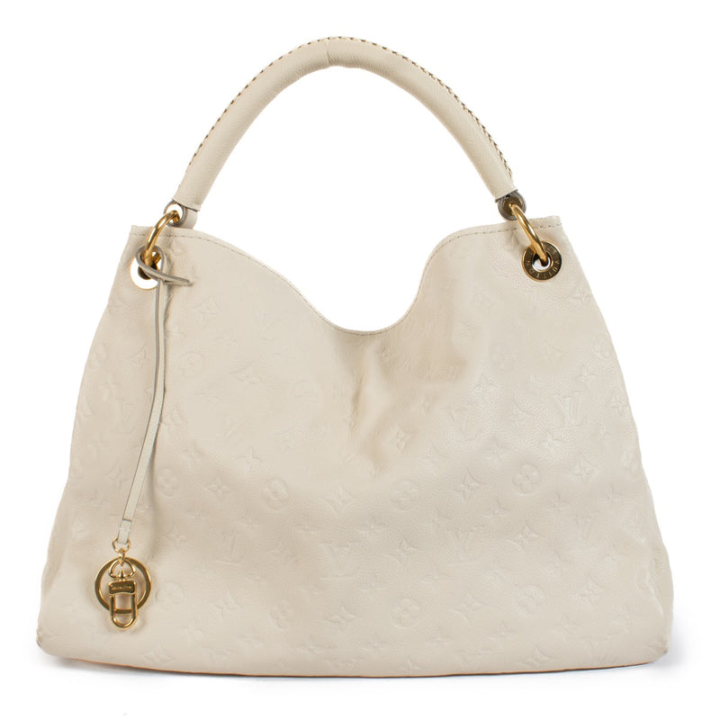 Shop safe online at Labellov in Antwerp, Brussels and Knokke this 100% authentic second hand Louis Vuitton White Monogram Artsy MM Bag