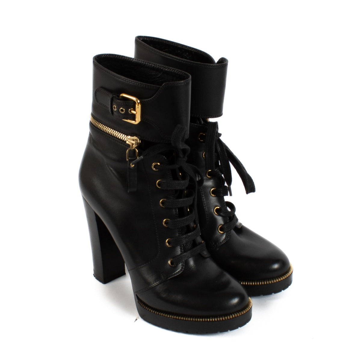 Shop safe online at Labellov in Antwerp, Brussels and Knokke this 100% authentic second hand Sergio Rossi Black Leather Zip and Buckle Boots - Size 38,5