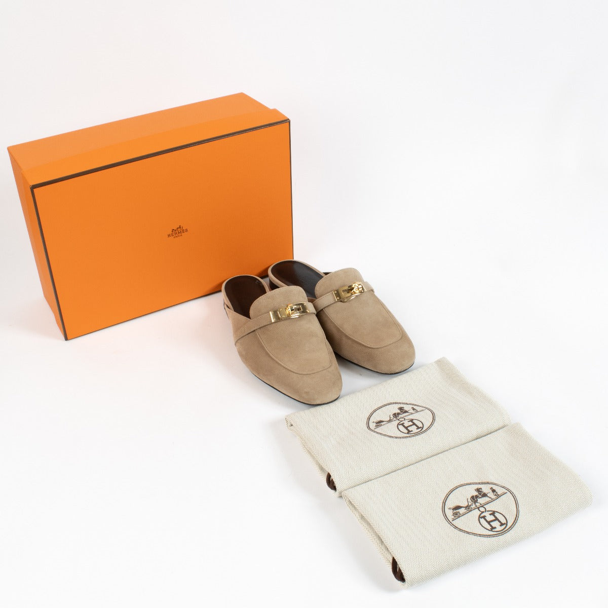 authentic preloved Hermès Beige Oz Mules on labellov.com
