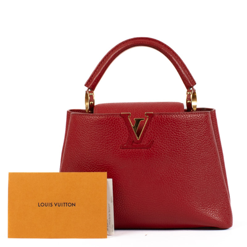 Shop safe online at Labellov in Antwerp, Brussels and Knokke this 100% authentic second hand Louis Vuitton Scarlet Red Capucines BB