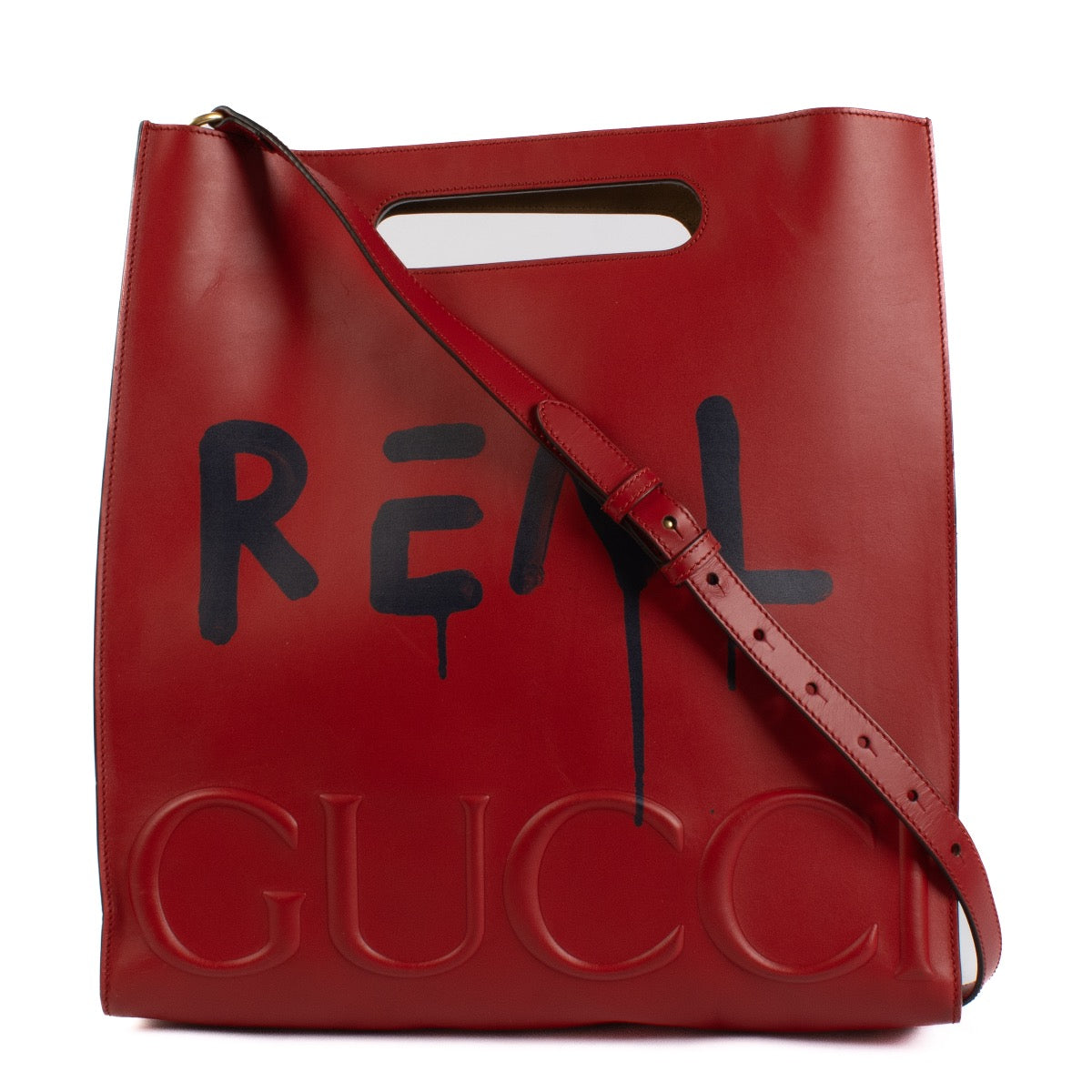 Shop safe online at Labellov in Antwerp and Knokke this 100% authentic second hand Gucci Red and Black Leather Graffiti Ghost Tote Crossbody Bag