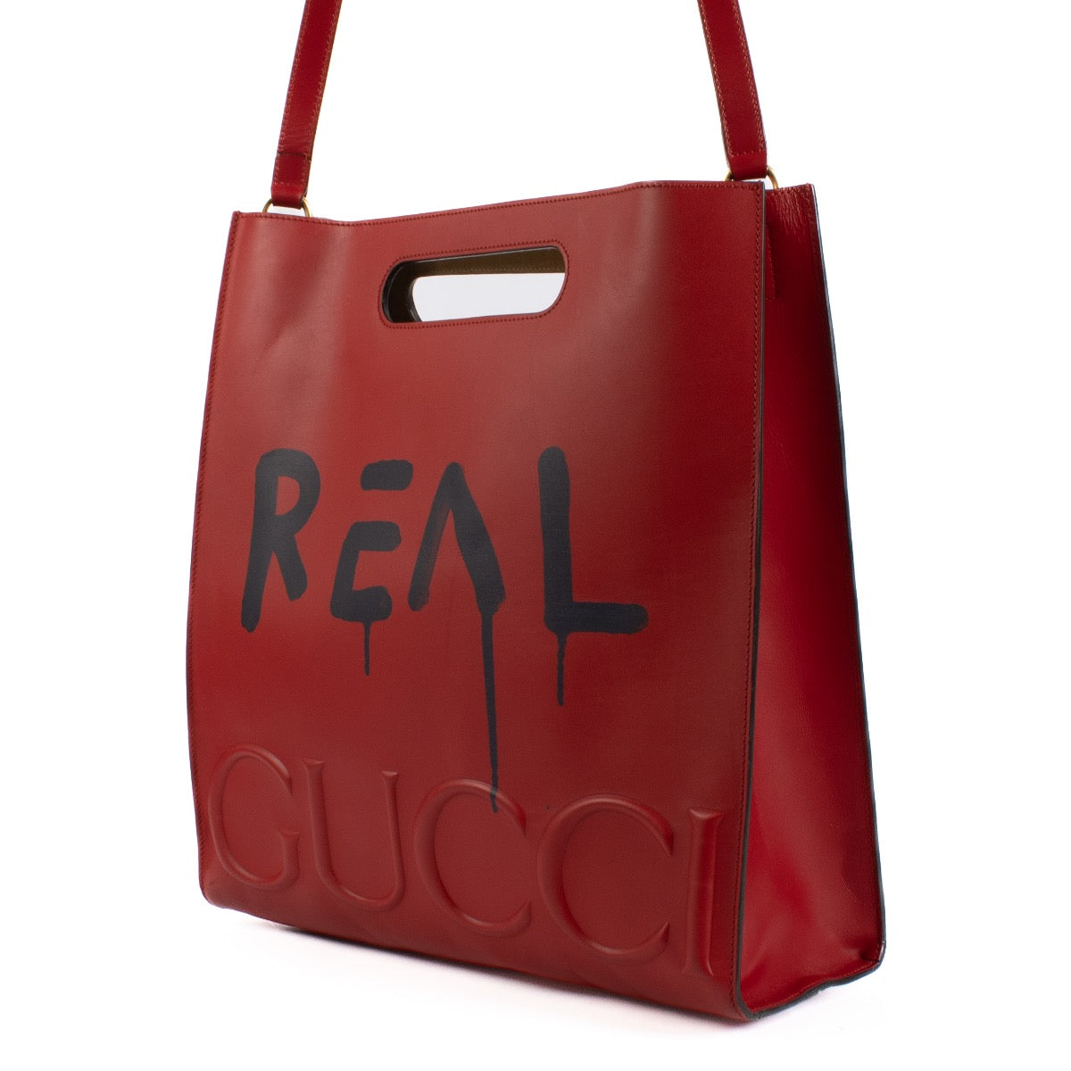 Shop safe online at Labellov in Antwerp and Knokke this 100% authentic second hand Gucci Red and Black Leather Graffiti Ghost Tote Crossbody Bag