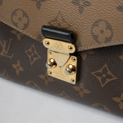 Authentic pre-loved Louis Vuitton Pochette Metis Monogram Reverse on Labellov.com