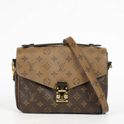 Authentic pre-loved Louis Vuitton Pochette Metis Monogram Reverse on Labellov.com