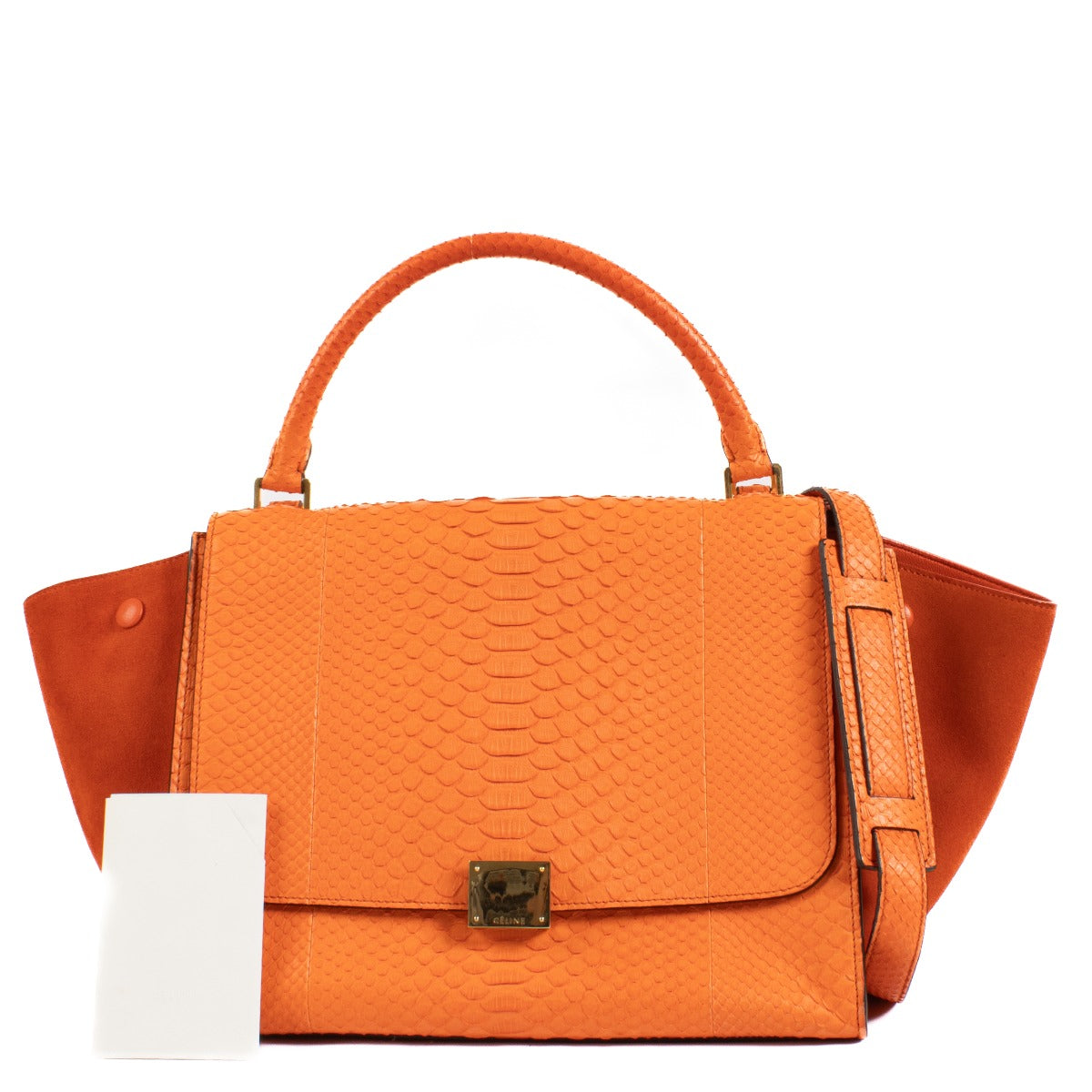 Shop safe online at Labellov in Antwerp, Brussels or Knokke this 100% authentic second hand Celine orange Python/ Suede Medium Trapeze Bag