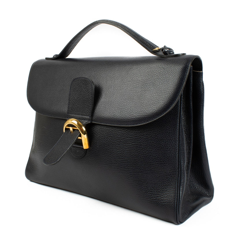 Delvaux Blue Brillant Briefcase in grained leather, featuring a structured silhouette, signature gold buckle, and spacious interior for office essentials. Shop at Labellov.