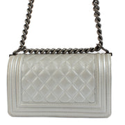 Shop safe online at Labellov in Antwerp, Brussels and Knokke this 100% authentic second hand Chanel Silver Quilted Small Boy Bag