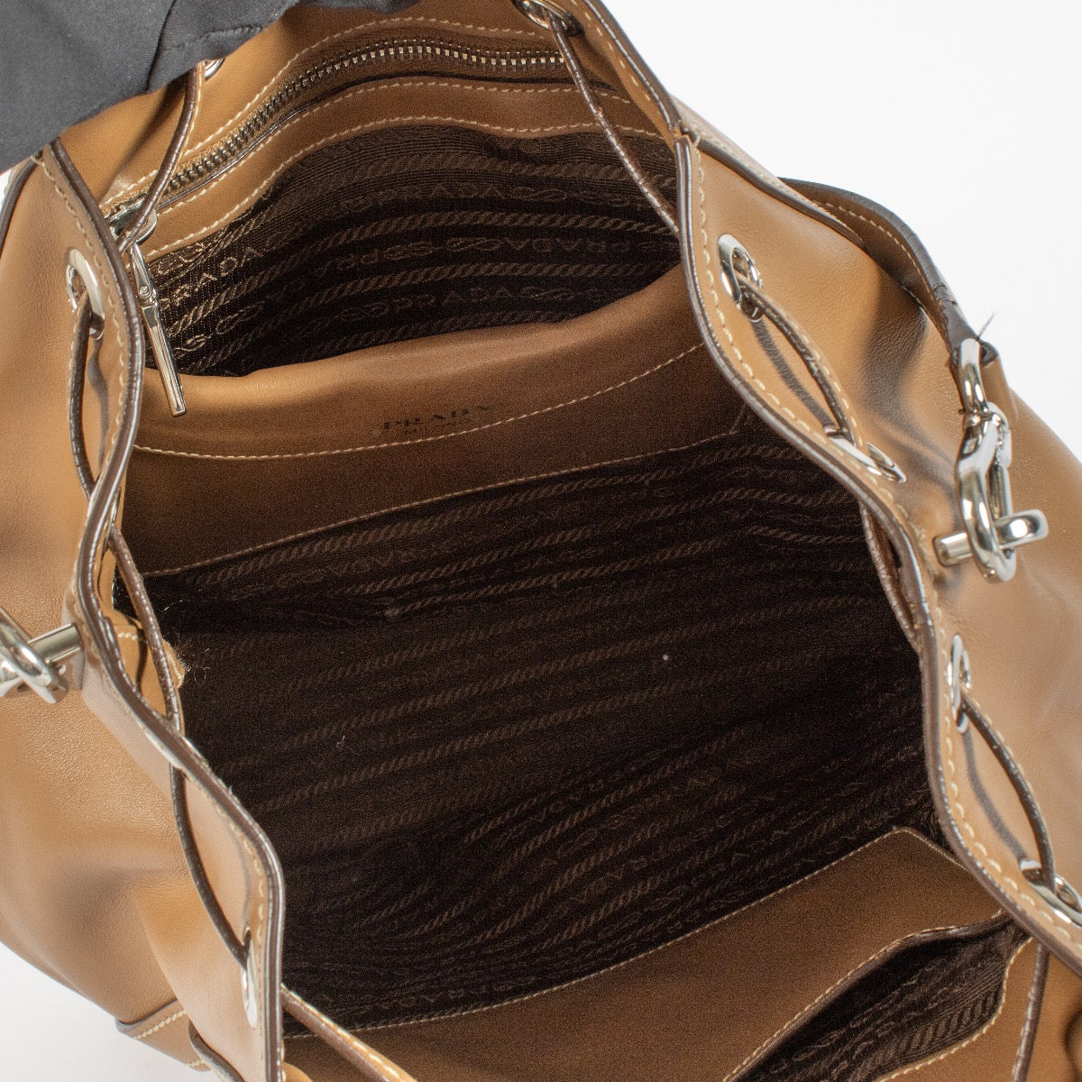 Authentic pre-loved Prada Brown Bucket Bag on Labellov.com