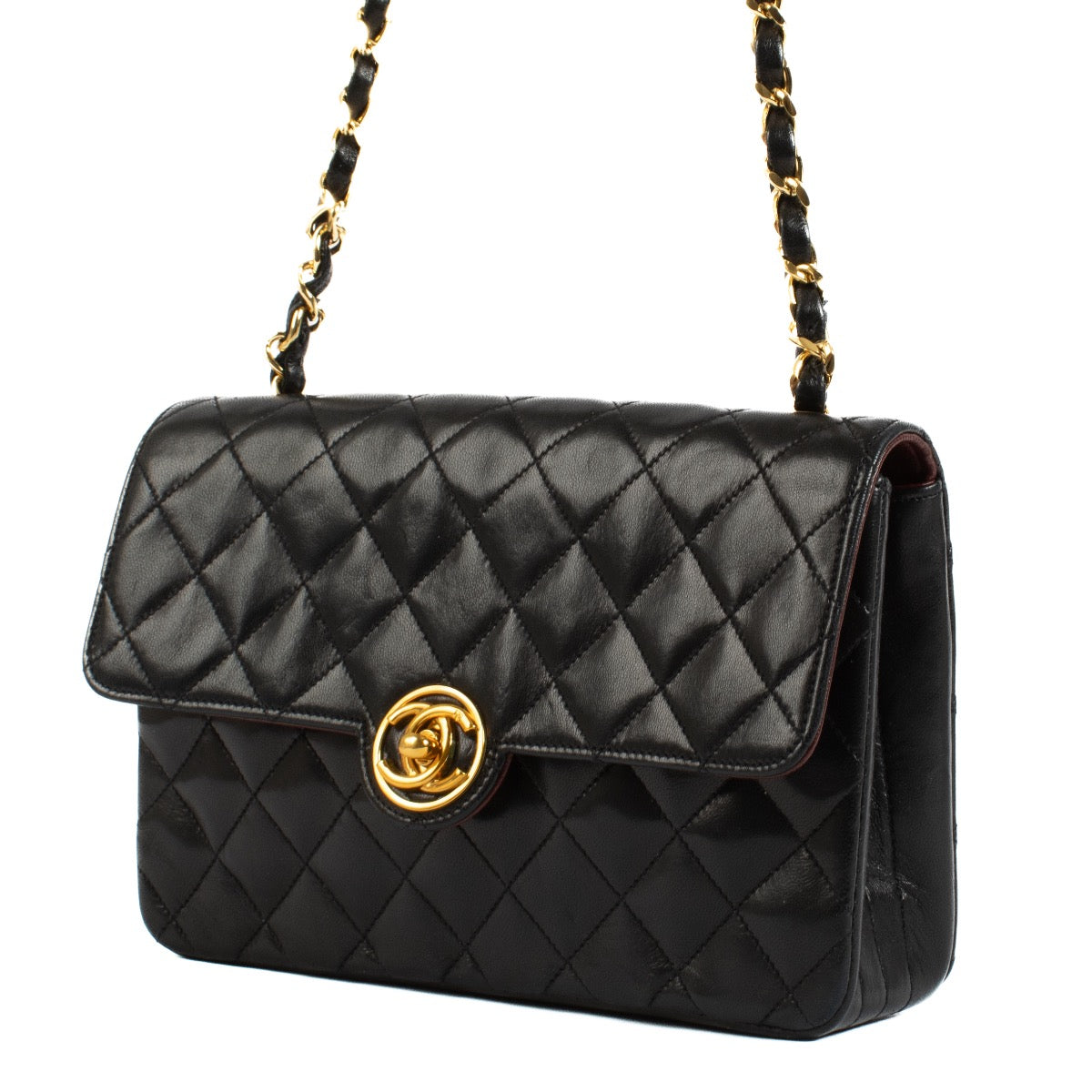 Shop safe online at Labellov in Antwerp, Brussel and Knokke this 100% authentic second hand Chanel Vintage Black Quilted Lambskin Circle CC Mini Flap Bag