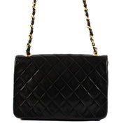 Shop safe online at Labellov in Antwerp, Brussel and Knokke this 100% authentic second hand Chanel Vintage Black Quilted Lambskin Circle CC Mini Flap Bag