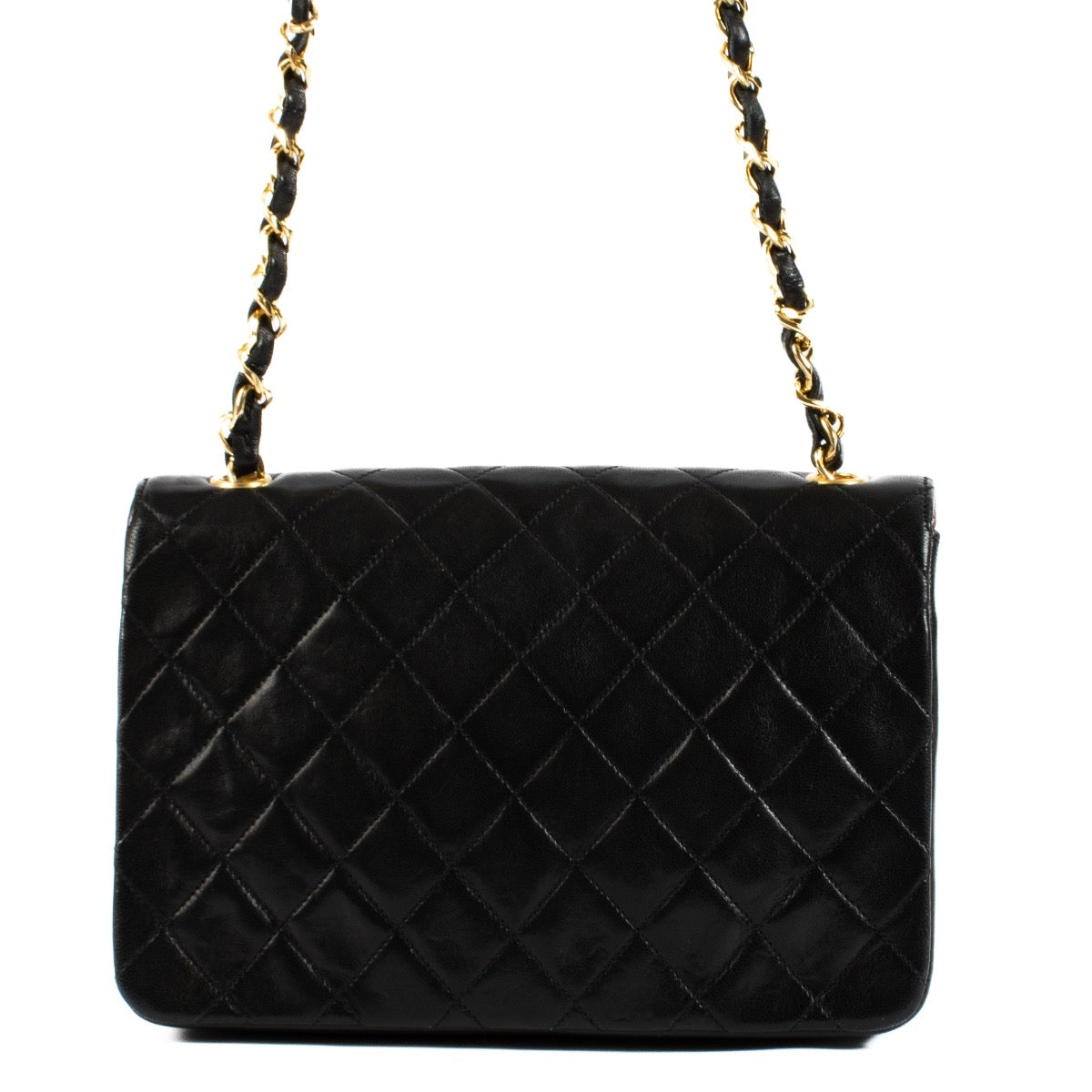 Shop safe online at Labellov in Antwerp, Brussel and Knokke this 100% authentic second hand Chanel Vintage Black Quilted Lambskin Circle CC Mini Flap Bag