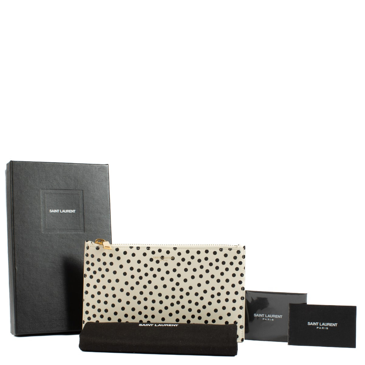 Shop safe online at Labellov in Antwerp, Brussels and Knokke this 100% authentic second hand Saint Laurent Polka Dot Zipped Small Pouch