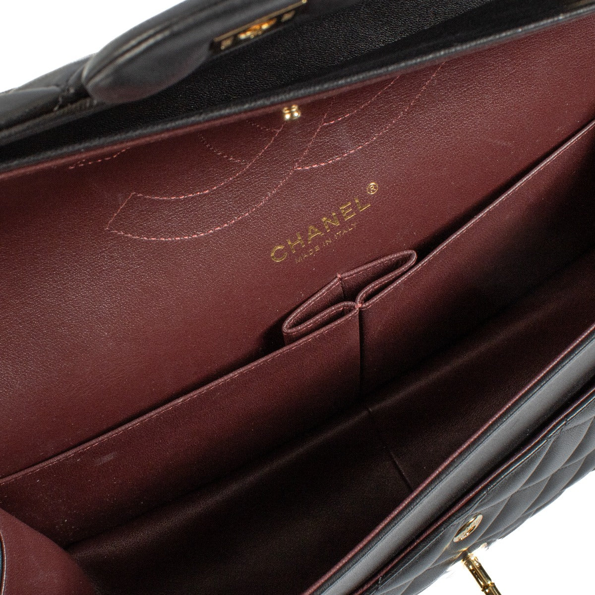 Shop 100% authentic Chanel Black Lambskin Large Classic Double Flap Bag at Labellov.com.