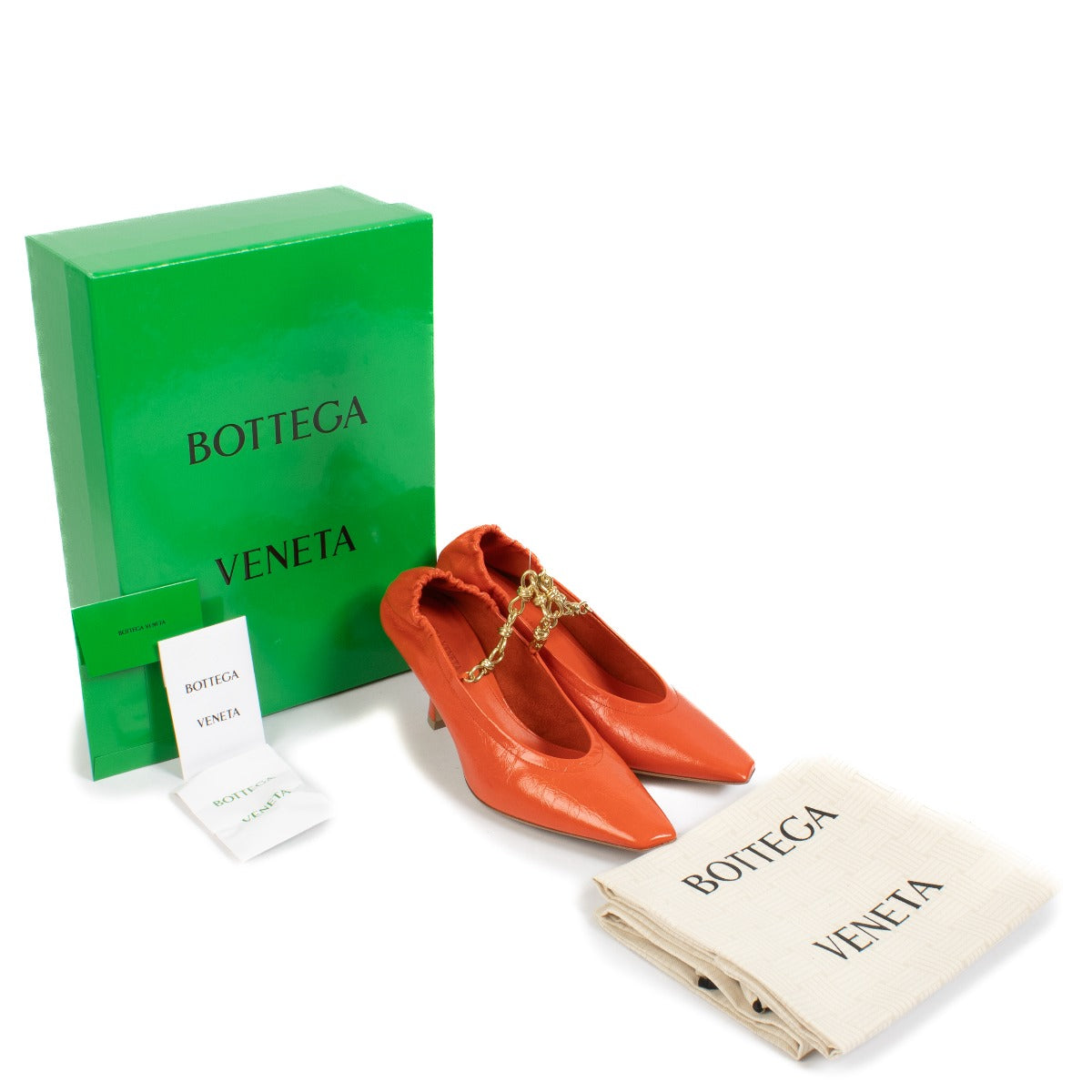 100% authentic pre loved Bottega Veneta Orange Sharp Chain Pump - Size 38 on Labellov.com