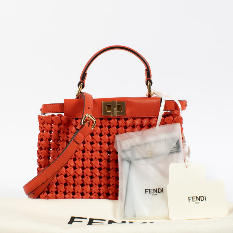 Shop safe online at Labellov in Antwerp, Brussels and Knokke this 100% authentic second hand Fendi Red Woven Leather Mini Peekaboo Bag