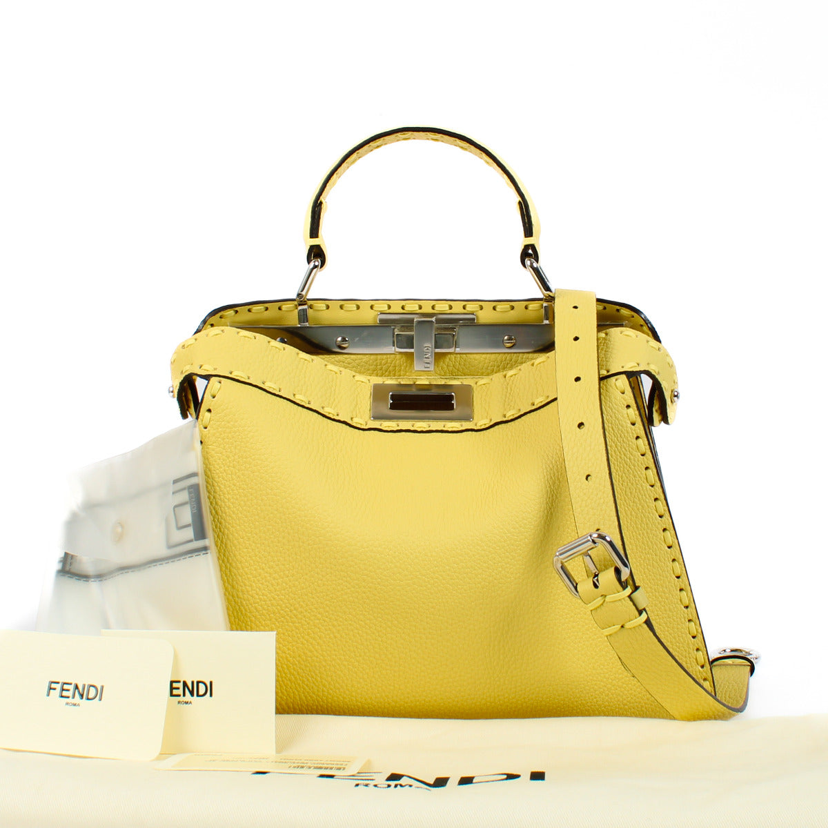 We buy and sell your preloved and brand new designer bags such as this Fendi Yellow Peekaboo IseeU Small Bag