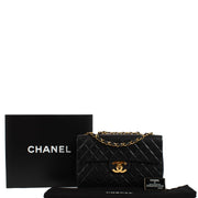 shop 100% authentic second hand Chanel Black Vintage Maxi Classic Flap Bag on Labellov.com