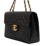shop 100% authentic second hand Chanel Black Vintage Maxi Classic Flap Bag on Labellov.com