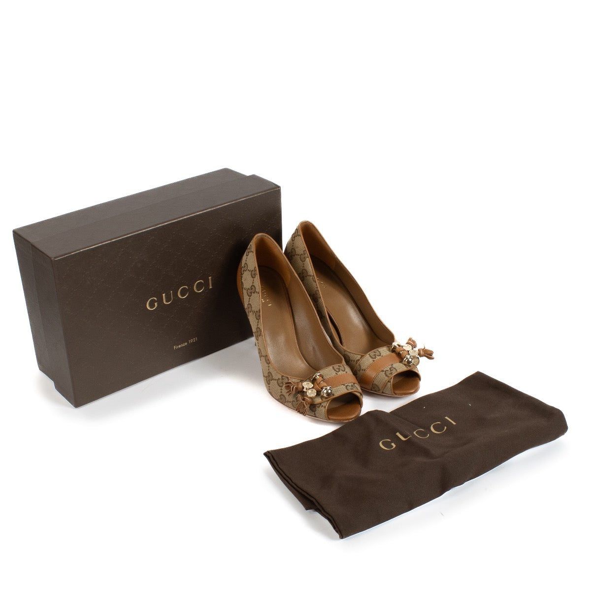 Shop safe online at Labellov in Antwerp, Brussels and knokke this 100% authentic second hand Gucci GG Canvas Open Toe Pumps - Size 39