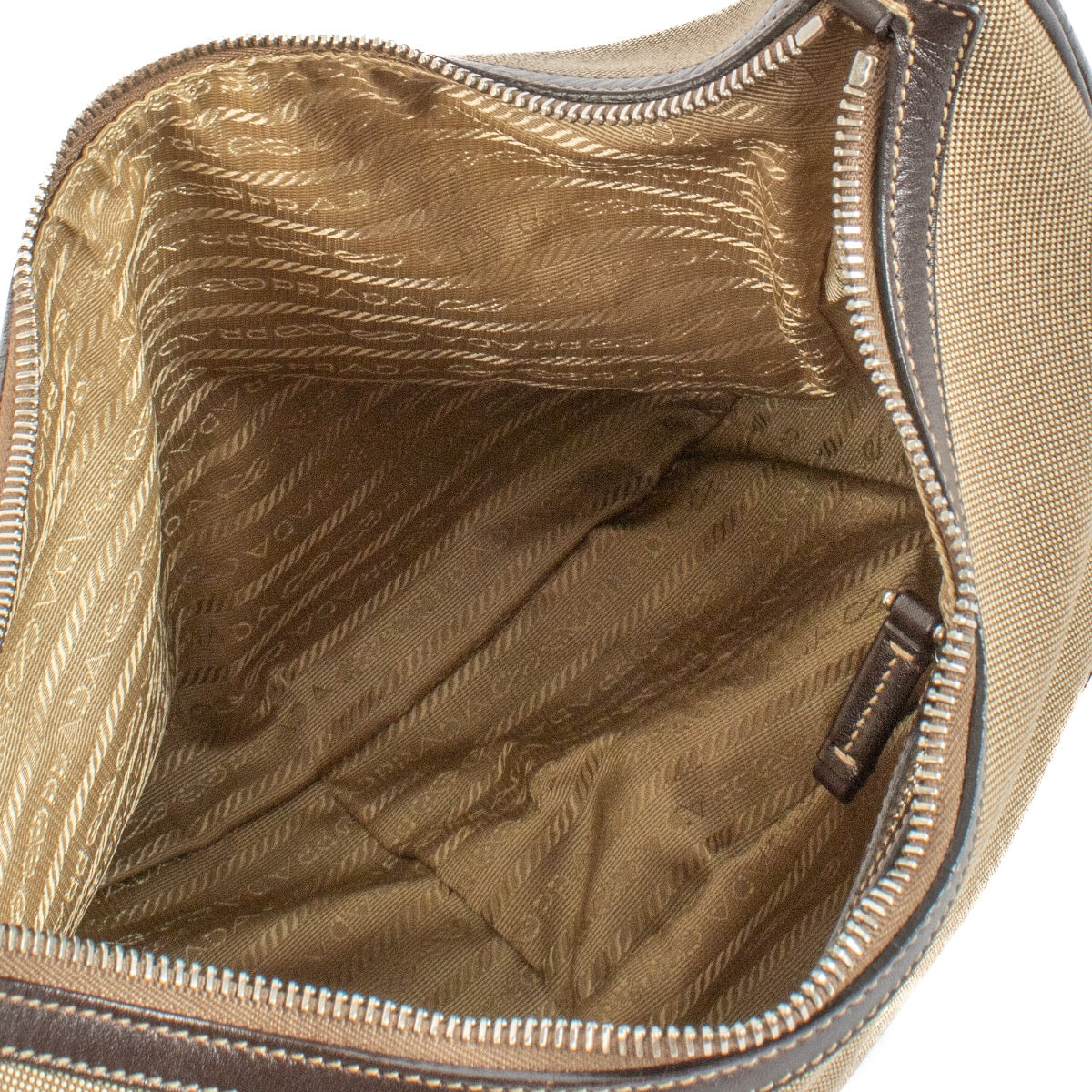 Shop safe online at Labellov in Antwerp, Brussels and knokke this 100% authentic second hand Prada Brown Logo Jacquard Hobo Shoulder Bag