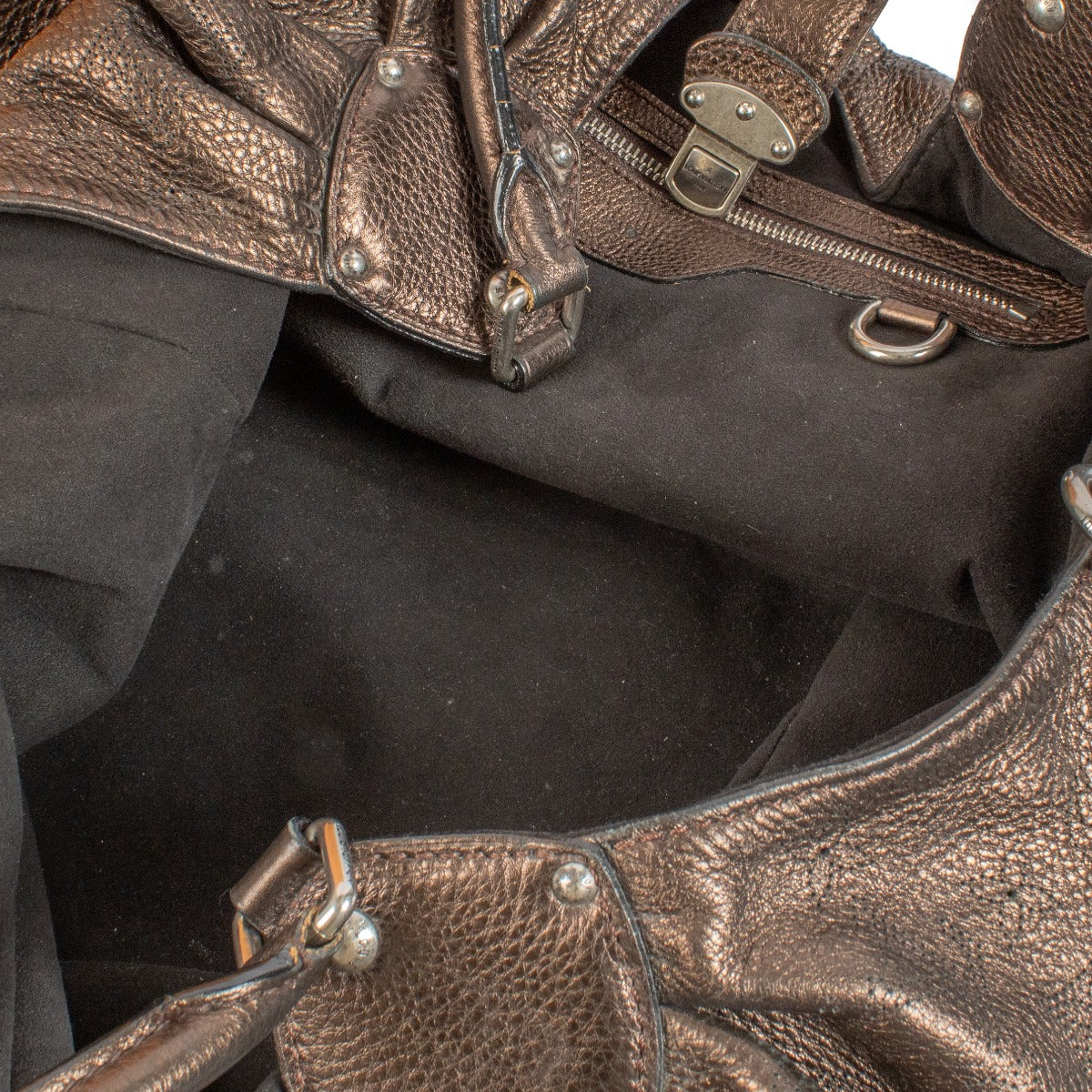 Shop safe online at Labellov in Antwerp, Brussels and Knokke this 100% authentic second hand Louis Vuitton Metallic Bronze Mahina Neo L Shoulder Bag