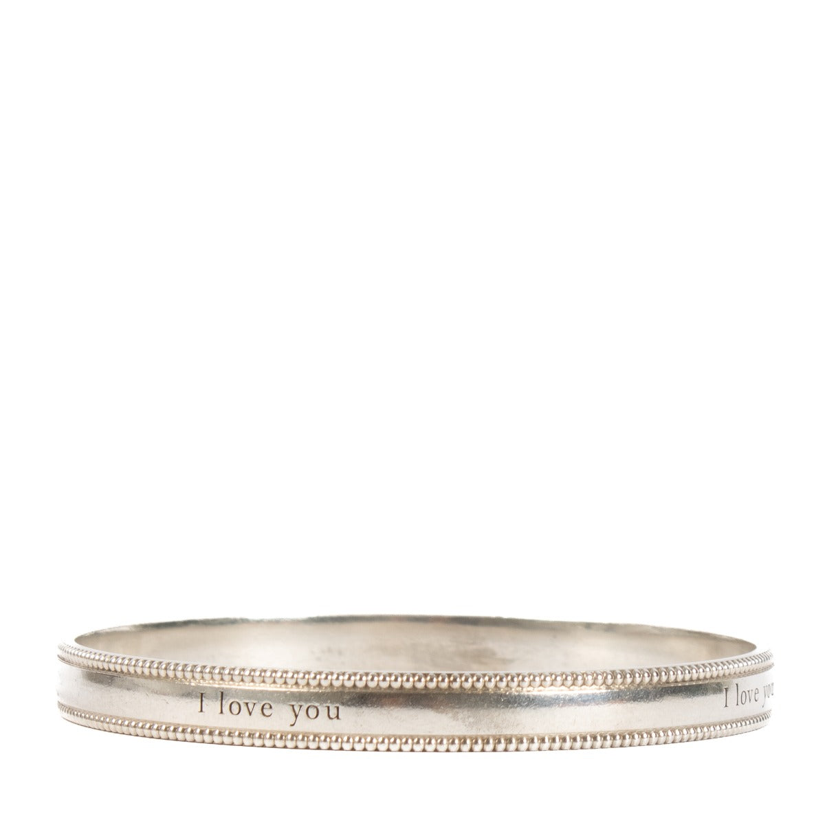 Shop safe online at Labellov in Antwerp, Brussels and Knokke this 100% authentic second hand Tiffany & Co. Silver I Love You Bangle Bracelet - Size 61