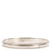 Shop safe online at Labellov in Antwerp, Brussels and Knokke this 100% authentic second hand Tiffany & Co. Silver I Love You Bangle Bracelet - Size 61