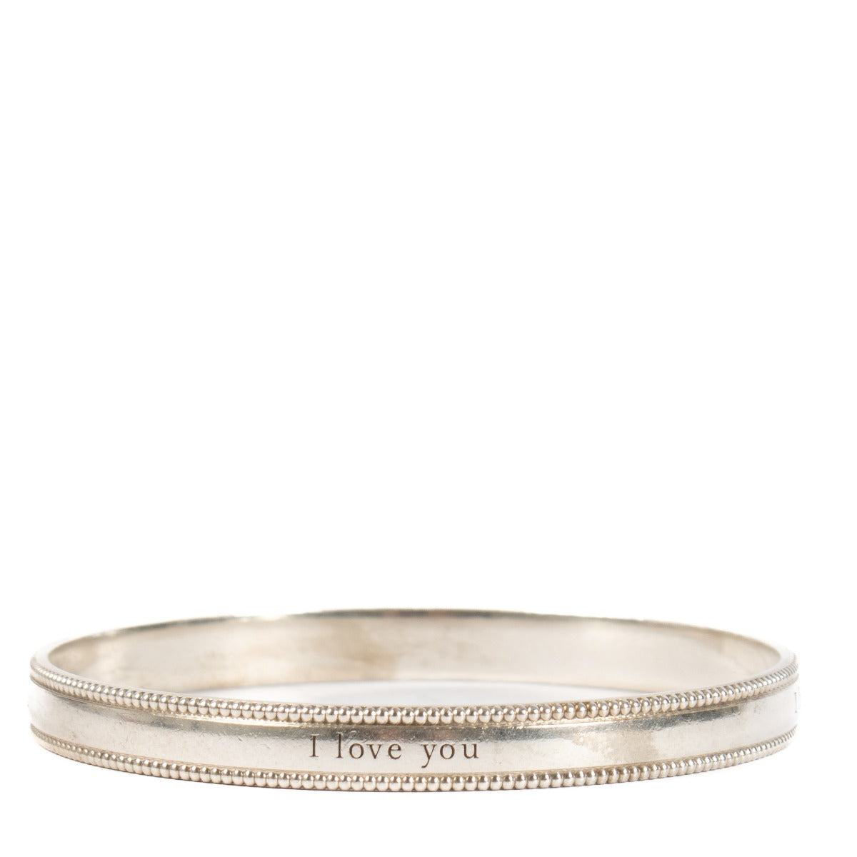 Shop safe online at Labellov in Antwerp, Brussels and Knokke this 100% authentic second hand Tiffany & Co. Silver I Love You Bangle Bracelet - Size 61