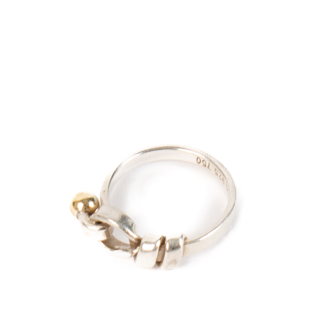 Shop safe online at Labellov in Antwerp, Brussels and Knokke this 100% authentic second hand Tiffany & Co Silver Love Knot 18k Gold Ball Ring - size 48