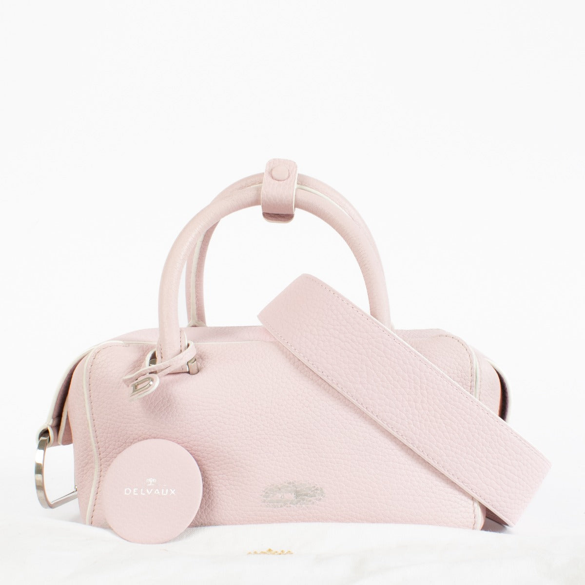 Authentic pre-loved Delvaux Pink Taurillon Soft Top Cool Box Bag on Labellov.com