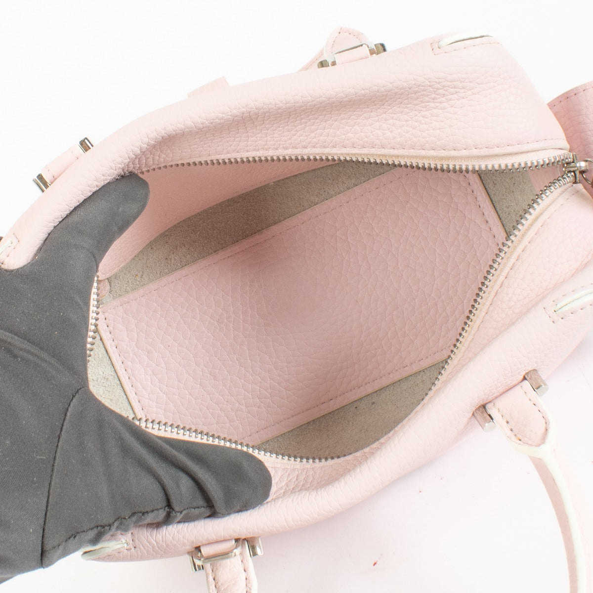 Authentic pre-loved Delvaux Pink Taurillon Soft Top Cool Box Bag on Labellov.com
