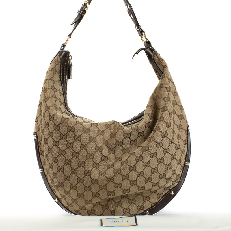 Koop uw authentieke designer Gucci GG Canvas Hobo Bag aan de beste prijs bij Labellov tweedehands luxe winkel in Antwerpen en Knokke