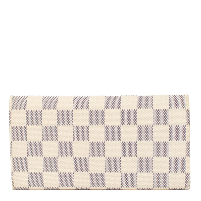Shop safe online at Labellov in Antwerp, Brussels and Knokke this 100% authentic second hand Louis Vuitton Damier Azur Emilie Wallet