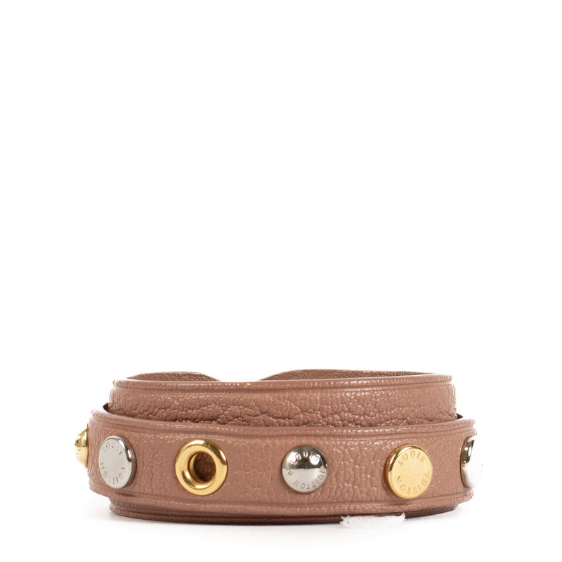 Shop safe online at Labellov in Antwerp and Knokke this 100% authentic second hand Louis Vuitton Pink Leather Spike It Bracelet