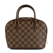 Shop safe online at Labellov in Antwerp, Brussels and Knokke this 100% authentic second hand Louis Vuitton Damier Ebene Sarria Mini Bag