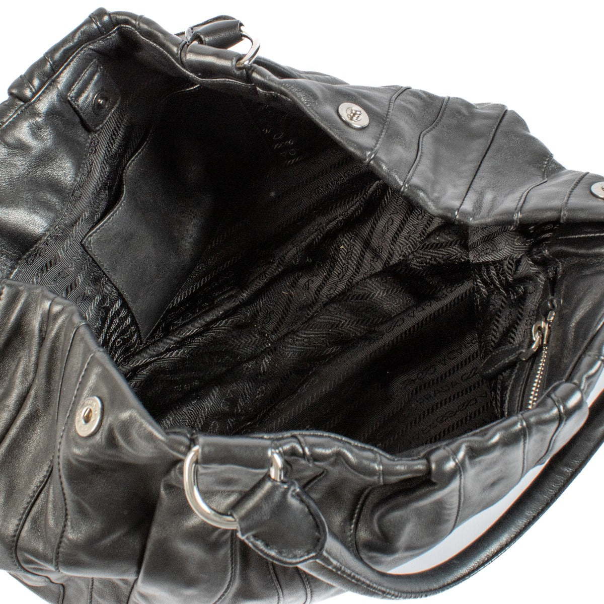 Shop safe online at labellov in Antwerp, Brussels and Knokke this 100% authentic second hand Prada Black Leather Waves Shoulder Bag