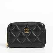 Authentic pre-loved Chanel Black Classic Zipped Card Holder Wallet on Labellov.com