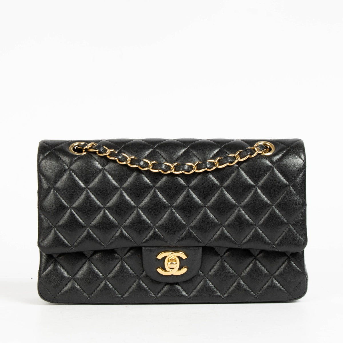Authentic pre-loved Chanel Black Lambskin Medium Classic 11.12 Handbag on Labellov.com