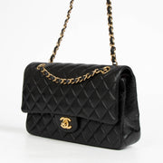 Authentic pre-loved Chanel Black Lambskin Medium Classic 11.12 Handbag on Labellov.com
