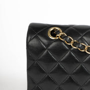 Authentic pre-loved Chanel Black Lambskin Medium Classic 11.12 Handbag on Labellov.com