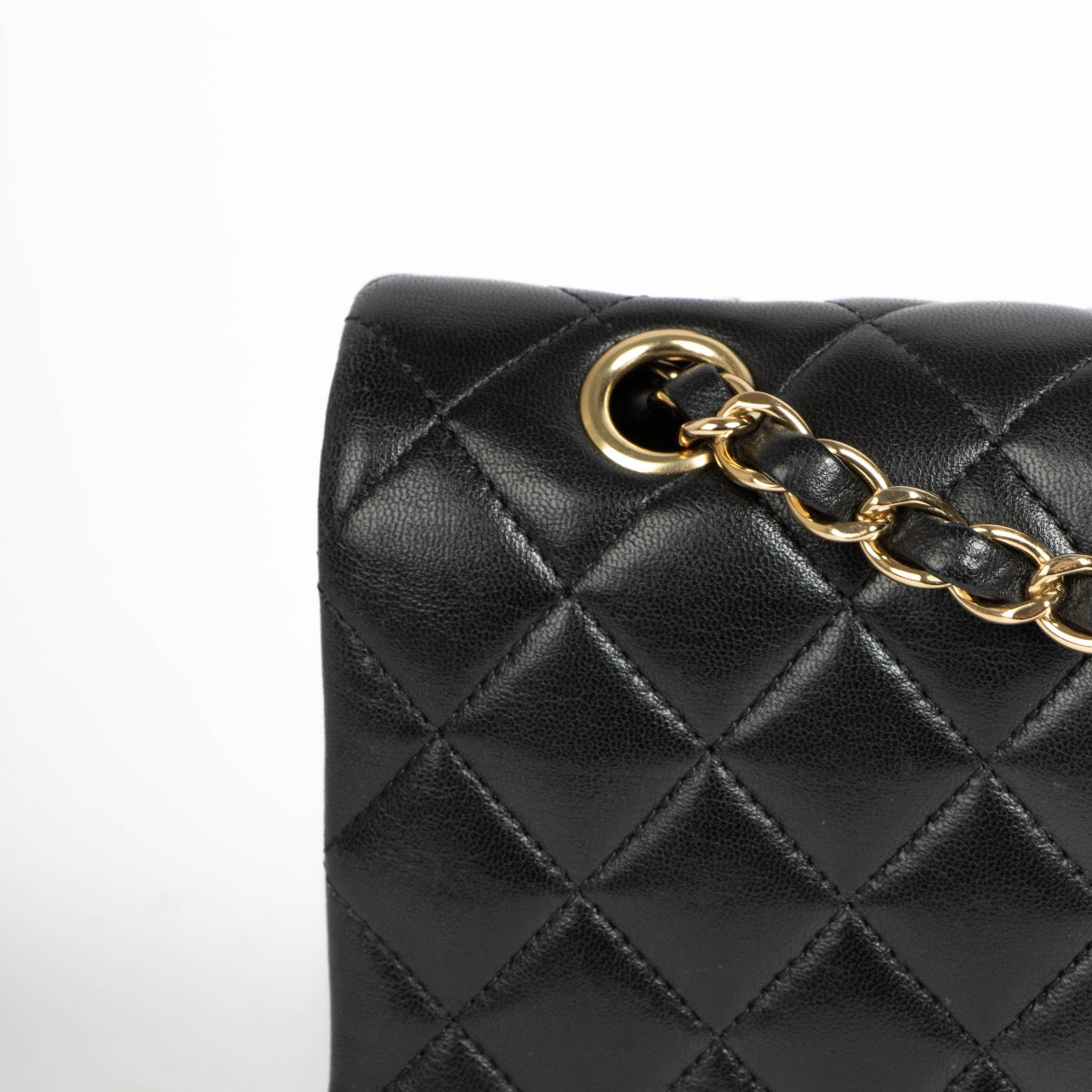 Authentic pre-loved Chanel Black Lambskin Medium Classic 11.12 Handbag on Labellov.com