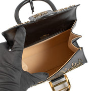 Shop safe online at Labellov in Antwerp, brussels and Knokke this 100% authentic second hand Delvaux Black Box Calf Mini Firework Brillant PM Bag